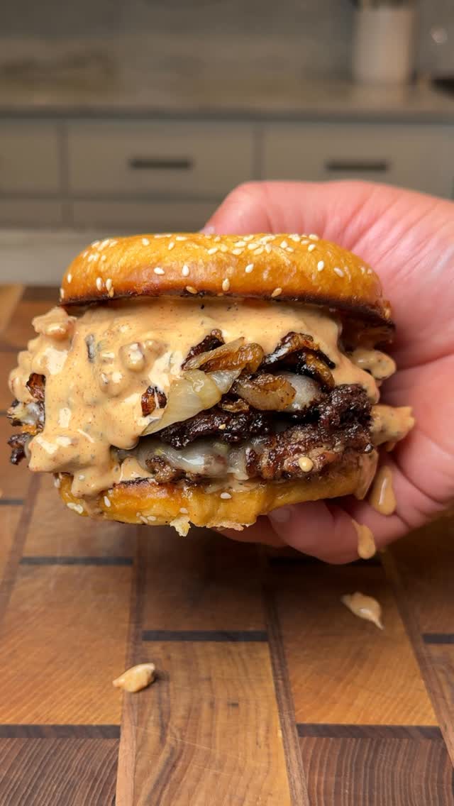 Instagram post by @burnt_pellet_bbq for Weber Grills. Caption reads: Smash burgers with Baconnaise sauce 

This is the....