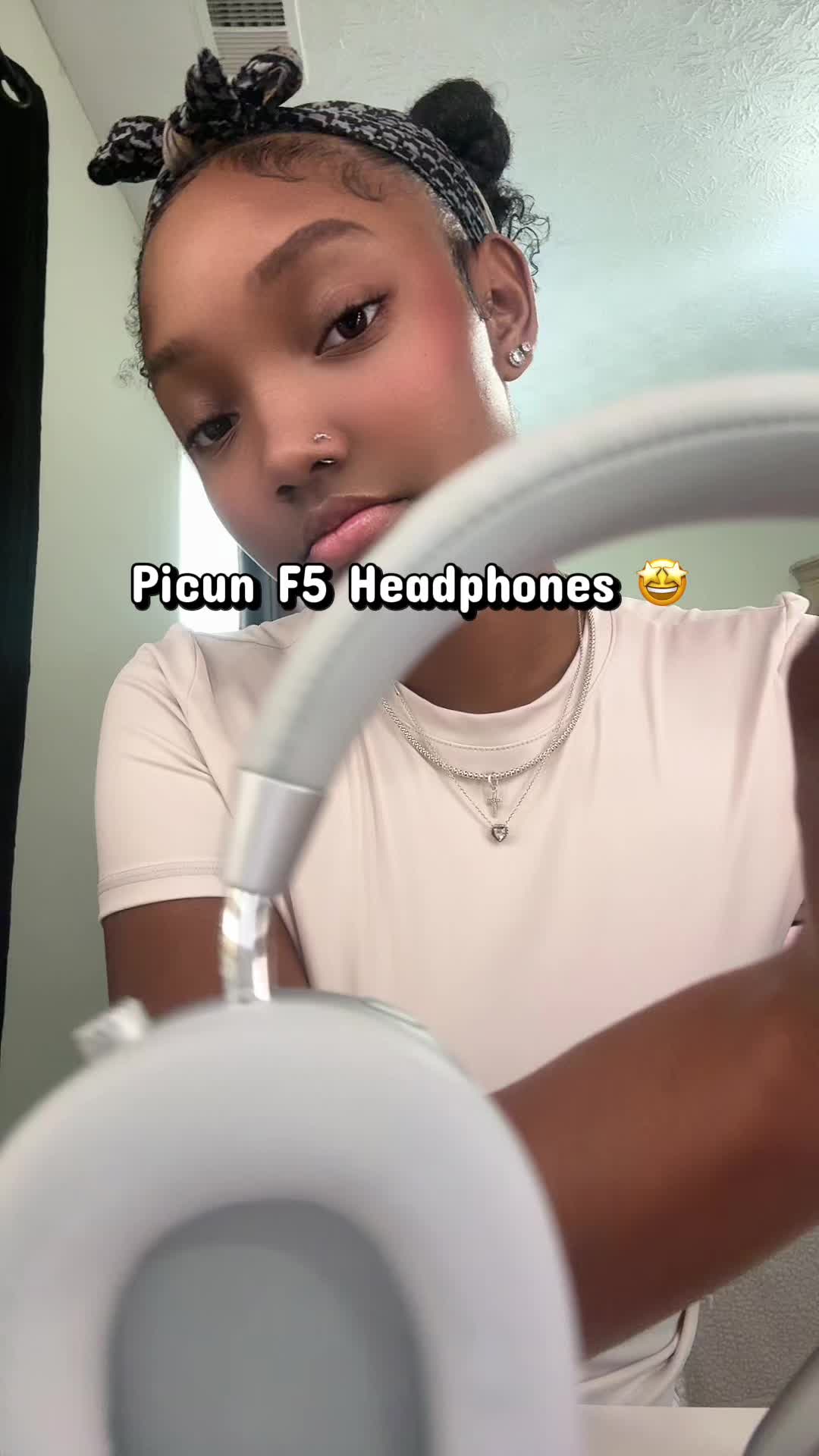 TikTok post by @da.only.kira for Picun. Caption reads: #headphones #summer #fyp @Picun US.