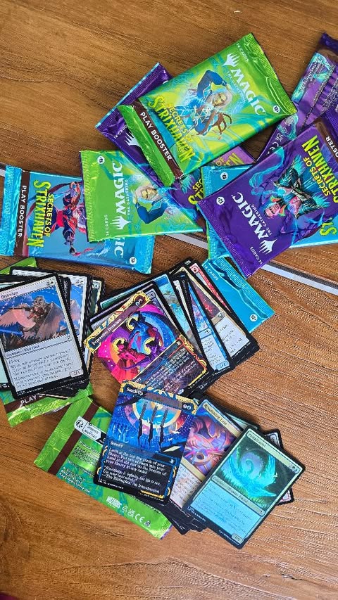 Instagram post by @kittycanteven for Magic: The Gathering. Caption reads: I'm unsure which is more expensive. Having a baby....