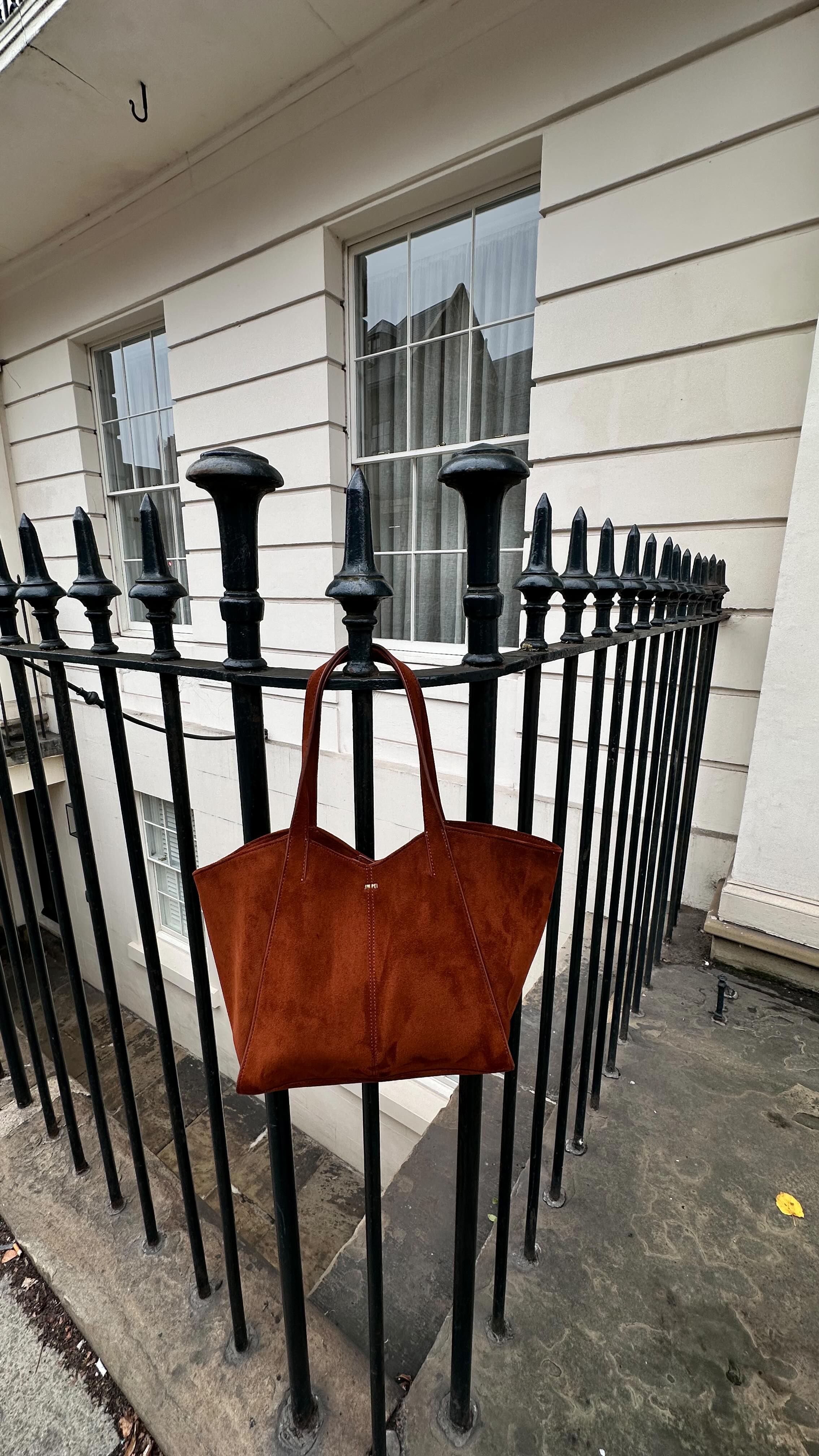 Instagram post by @shazmiller1 for JW PEI. Caption reads: [...] 
Shirt @veromoda 
Bag @jwpei_official....