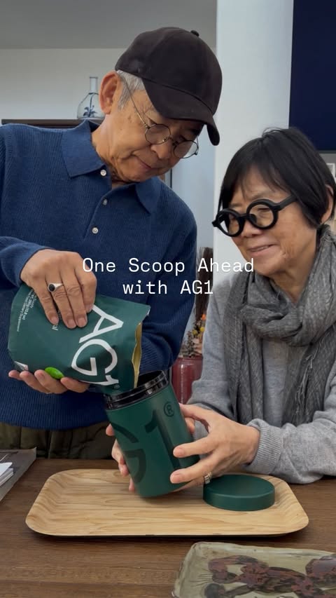 Instagram post by @akiandkoichi for AG1. Caption reads: [...] and take care of our foundation. @drinkag1....