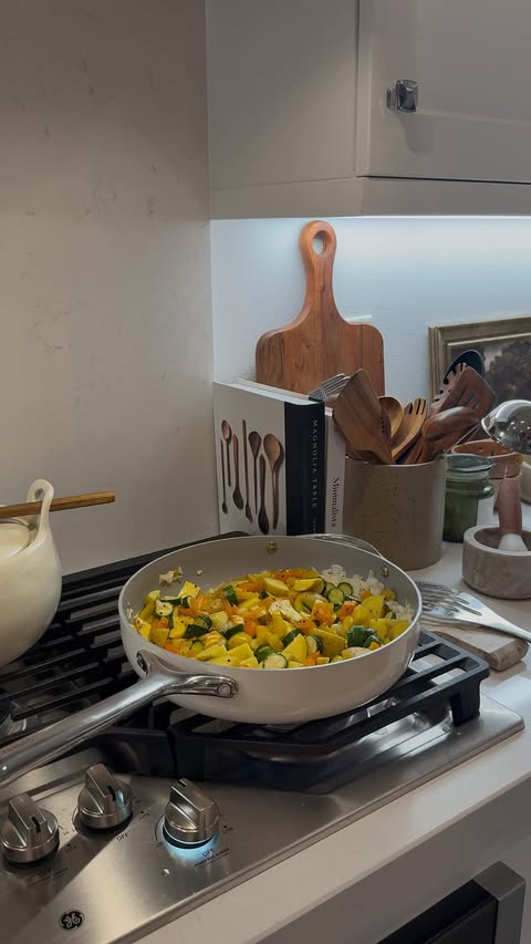 Instagram post by @_nicolesann for Caraway Home. Caption reads: cooking at home is a non negotiable this year....