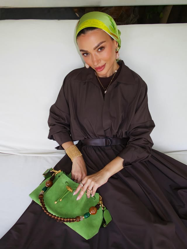 Instagram post by @rola_m for Jimmy Choo. Caption reads: Green suede kind of summer with @jimmychoo 🌴....
