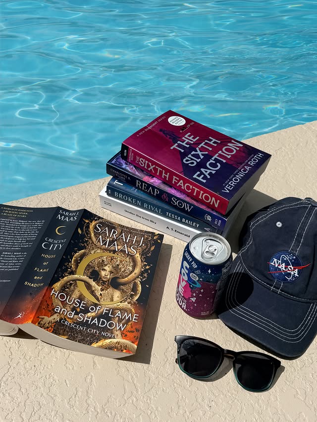 Instagram post by @beach.reading for Penguin Random House Audio. Caption reads: Who wants to come read fantasy books by the pool?....