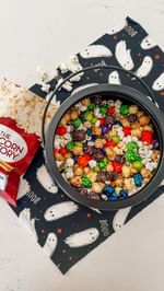 Instagram post by @k.neeekola for The Popcorn Factory. Caption reads: #Ad A spooky movie night isn’t complete without....