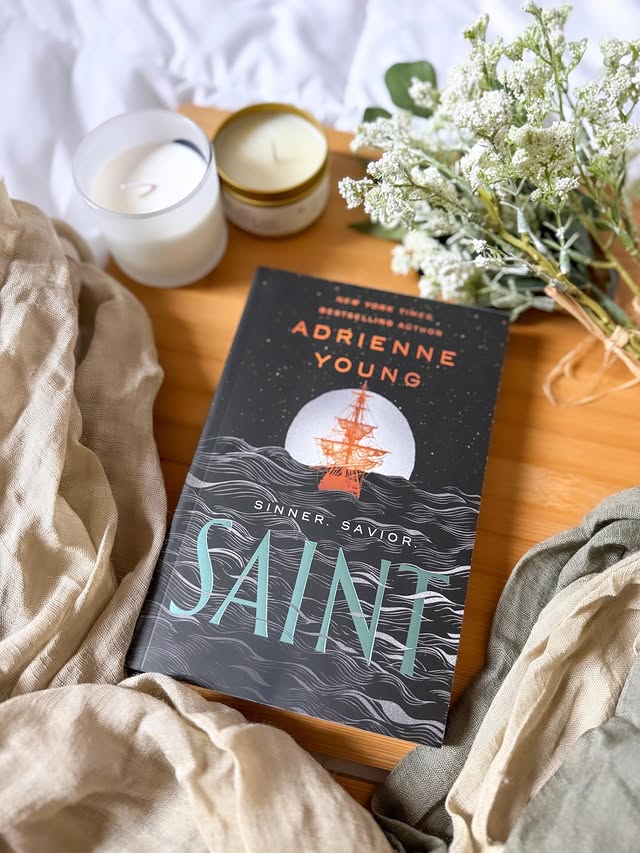 Instagram post by @jb_loves_books for Wednesday Books. Caption reads: || 𝗙𝗔𝗡𝗧𝗔𝗦𝗬 𝗙𝗥𝗜𝗗𝗔𝗬 ||

𝗦𝗮𝗶𝗻𝘁 𝗯𝘆....