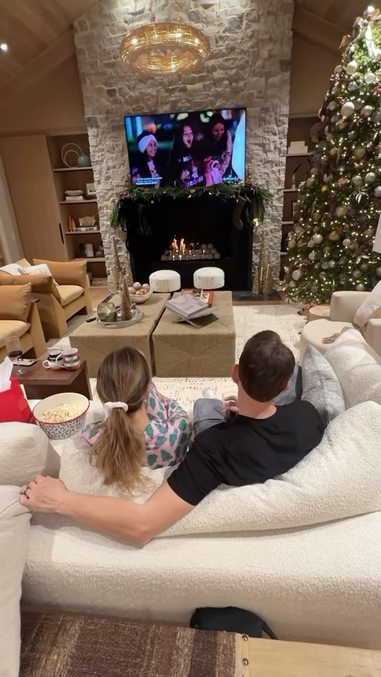 Instagram post by @torigerbig for Hallmark. Caption reads: 🎄✨ Cozy nights in are our favorite this time of....