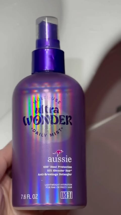 Instagram post by @lioness_nii for Aussie Hair. Caption reads: [...] much easier to detangle. @influenster....