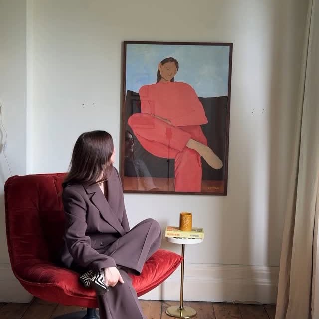 Instagram post by @kerryawalker_ for Wall of Art. Caption reads: [...] art to complete the living room 🫶🏼....