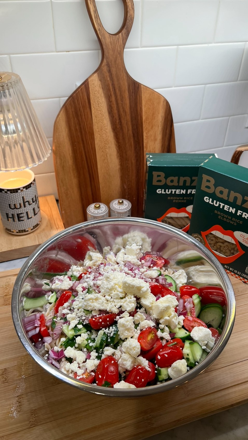 Instagram post by @claudiaaharrington for Banza. Caption reads: Gluten-free pasta salad!!🥗 deliciously made with....
