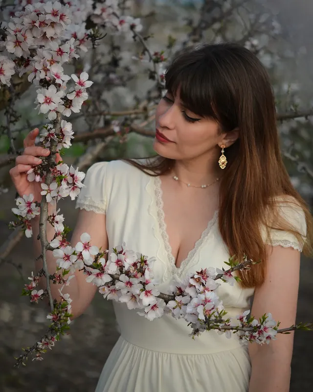 Instagram post by @nastasiagian for Rihoas. Caption reads: [...] of blooming in our own time..! Dress by....