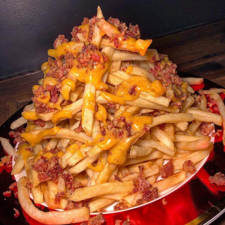 Instagram post by @eatmorebemore for Foodie Tribe. Caption reads: [...] better? Add bacon and enjoy them with....