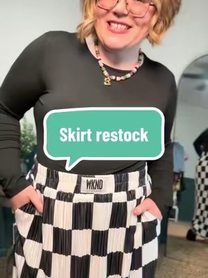 TikTok post by @specsbex for WKND Chasers. Caption reads: [...] favorite skirt is finally back 🏁🖤 @WKND....