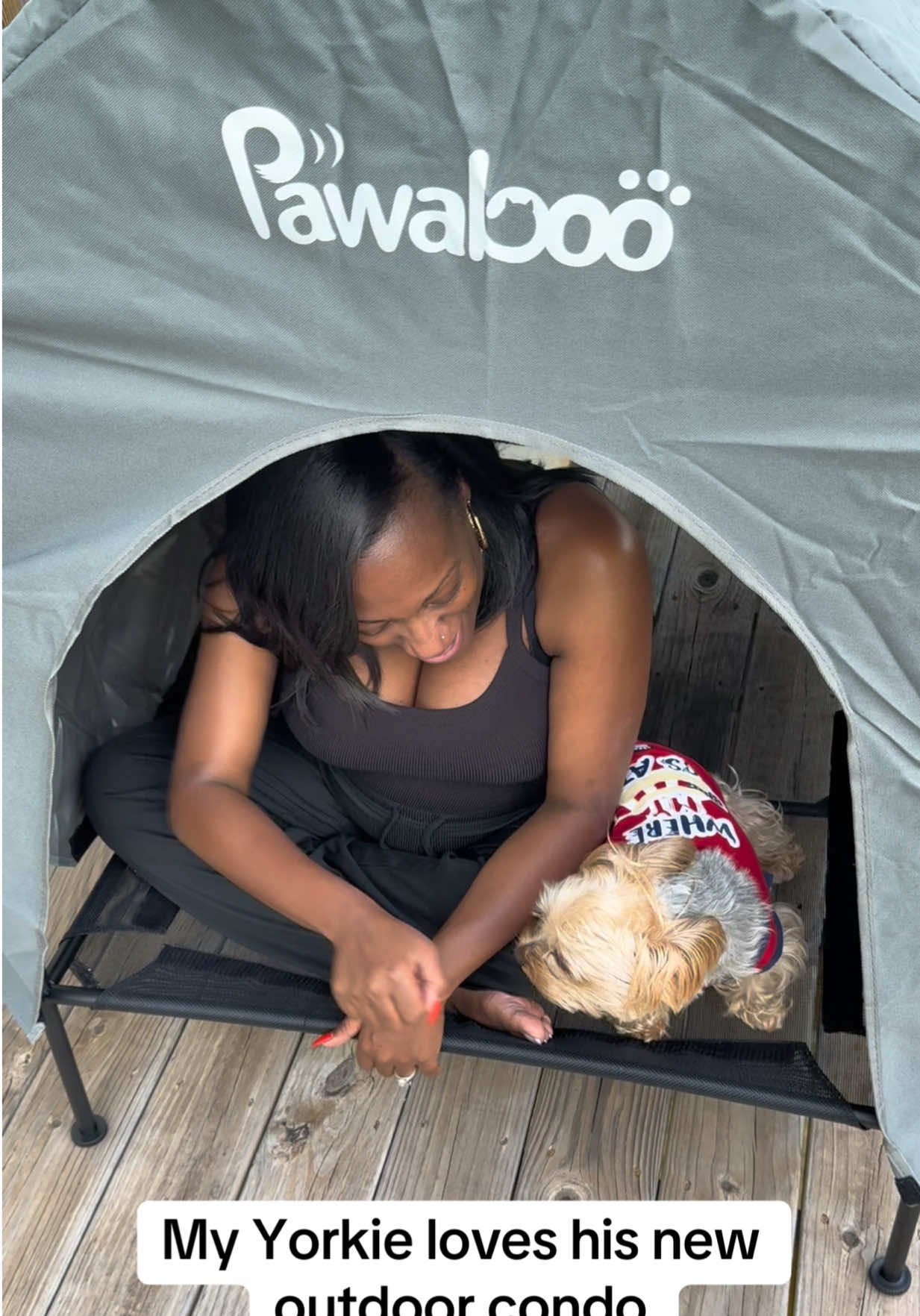 TikTok post by @justmuffpuff for Pawaboo. Caption reads: [...] is the outdoor condo every dog needs!!!....