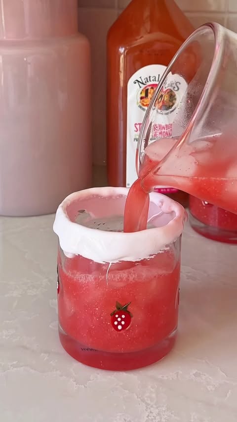 Instagram post by @mikayla.mcneany for Natalie's Orchid Island Juice. Caption reads: XXL sparkling strawberry lemonade 🩷🫧🍓🍋 The....