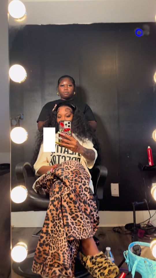 TikTok post by @thejaynoelle for Bling Hair. Caption reads: [...] a drink & a bag full of blues😍😍😍 @Bling....