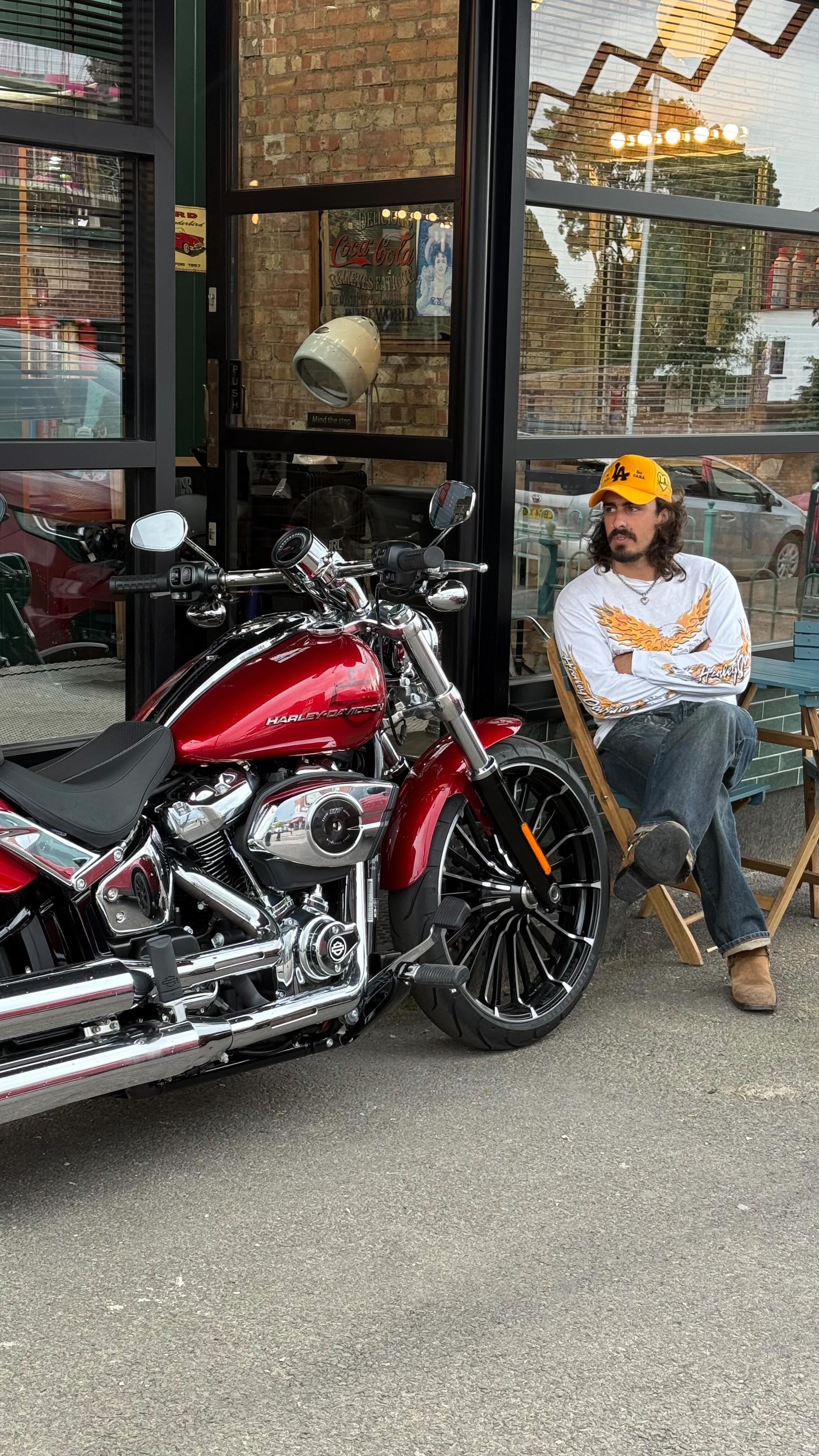 Instagram post by @tobias_bell for Harley-Davidson. Caption reads: A day in the life of your favourite hairdresser....