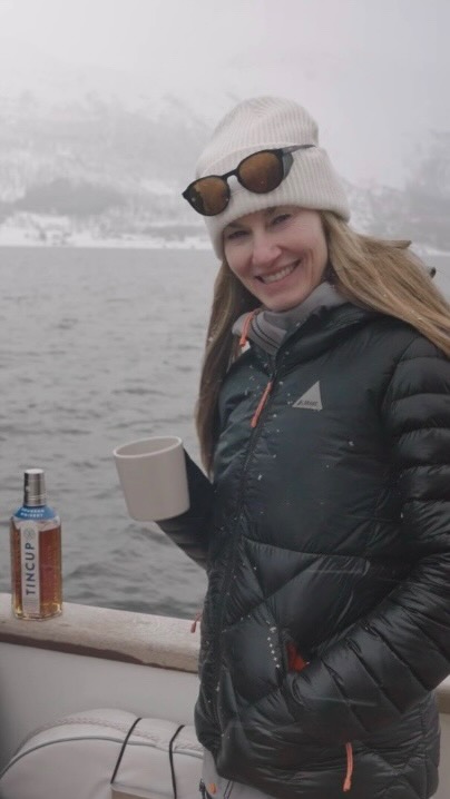 Instagram post by @elysesaugstad for TINCUP Whiskey. Caption reads: [...] trips, so it was fitting to have....