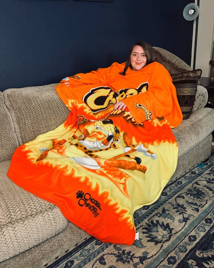Instagram post by @thisisbecsanne for Snuggie. Caption reads: [...] still keeping it sweet 🔥🧡 @officialsnuggie....