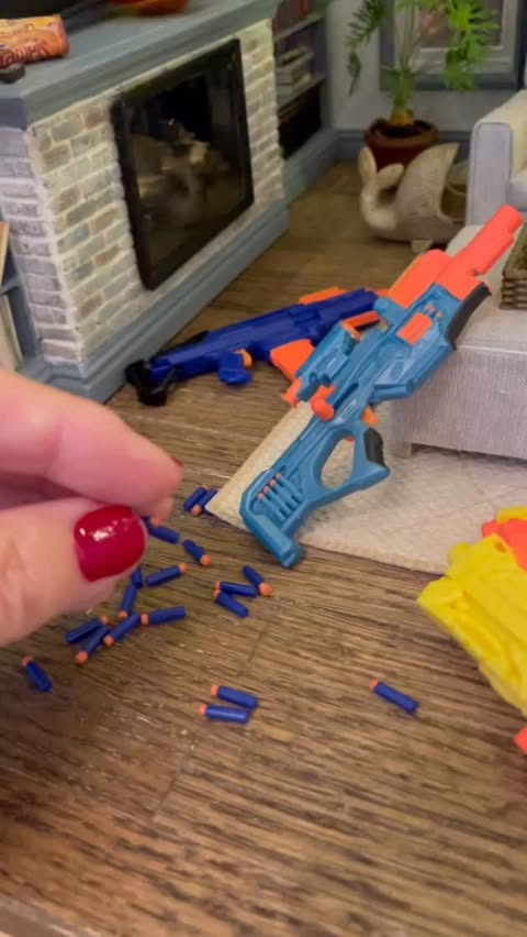 Instagram post by @momof8minis for Hasbro. Caption reads: Not sure what day it is, but the nerf bullets are....
