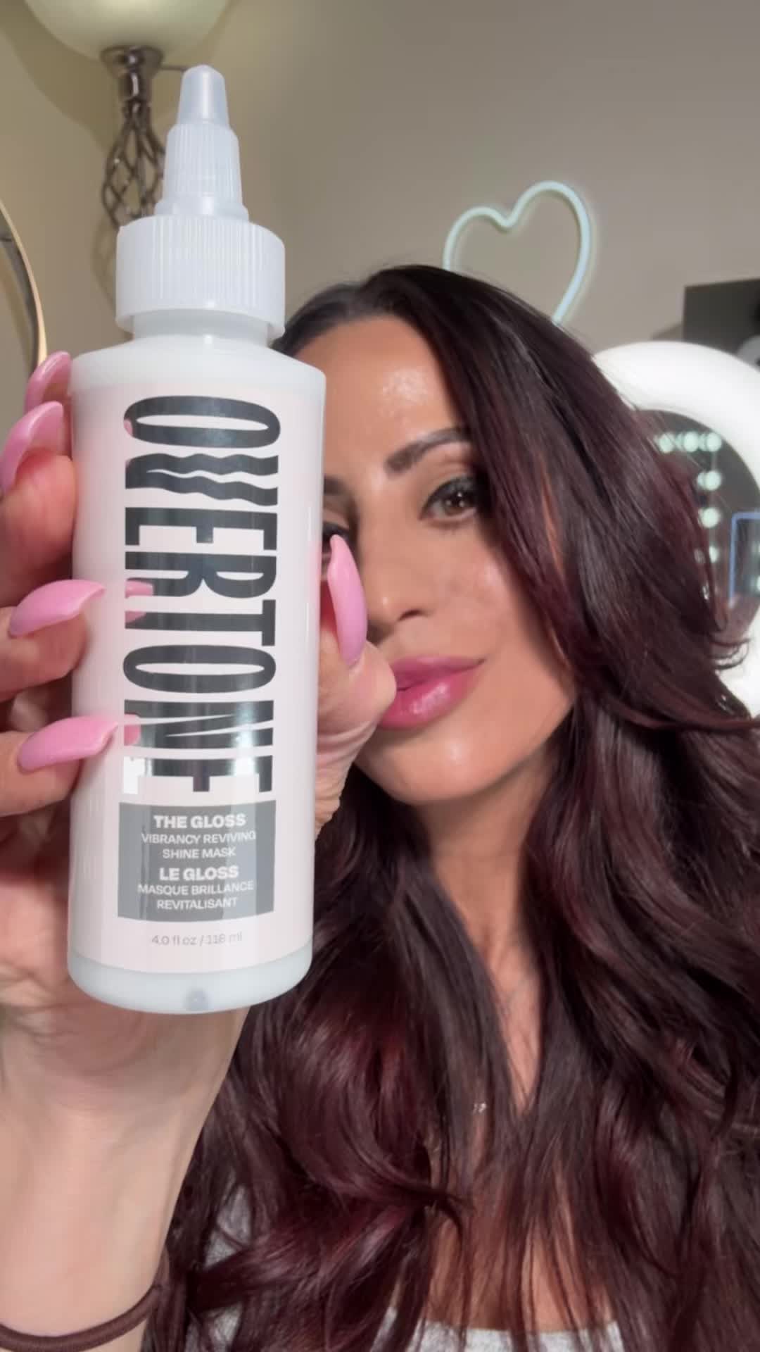 TikTok post by @makeupbysharonjoy for oVertone Color. Caption reads: [...] SHINE REVIVING TREATMENT MASK by @oVertone....