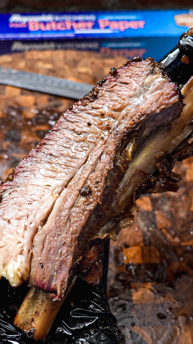 Instagram post by @offthechainwithjoe for Reynolds Brands. Caption reads: #ReynoldsPartner Thick-cut beef ribs. Wrapped in....