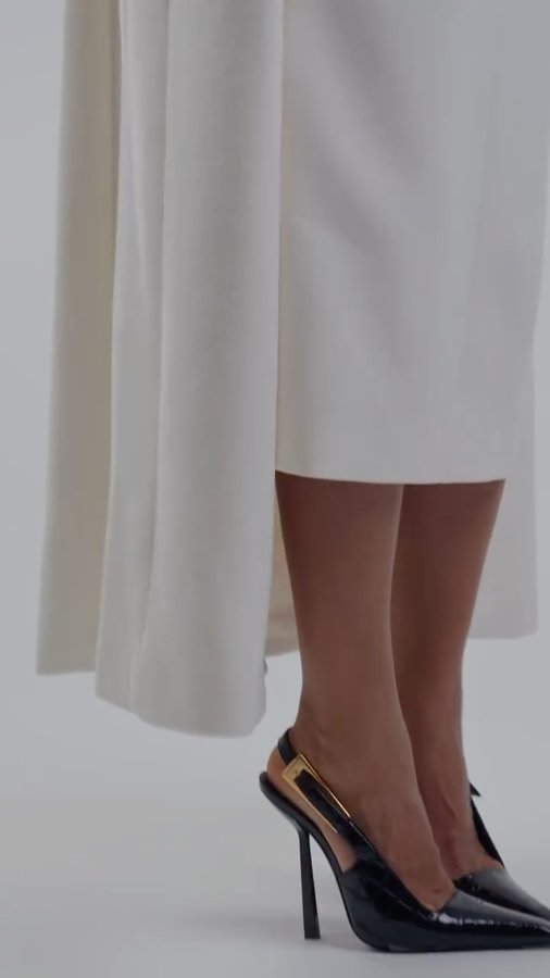 Instagram post by @aanishagurung_ for Karen Millen. Caption reads: Ad. Coat season is officially the personality now....