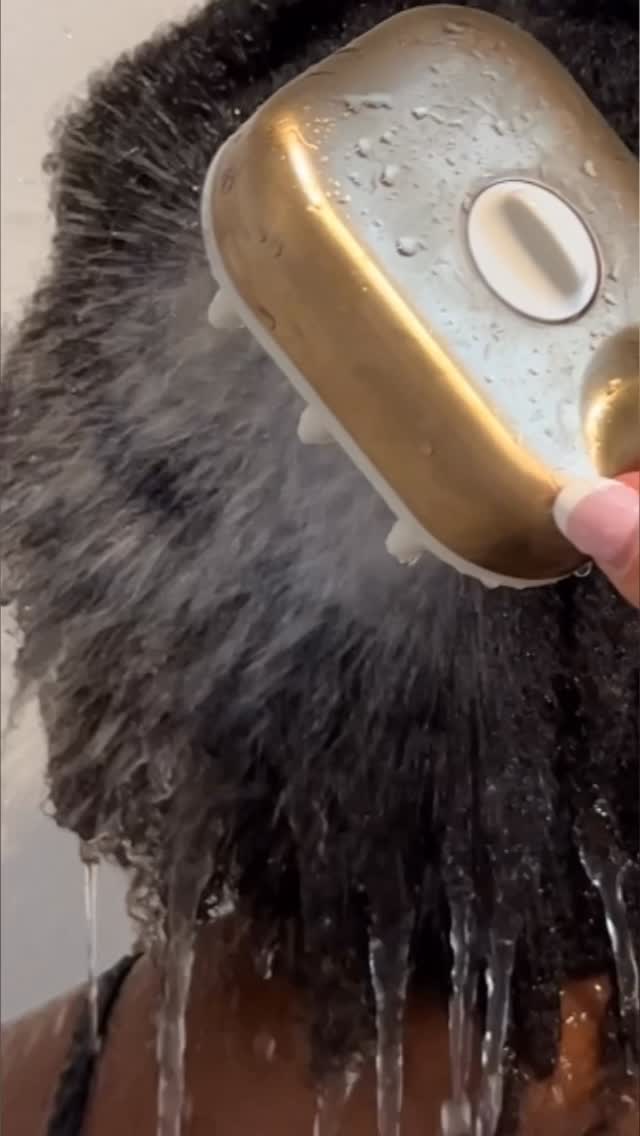 Instagram post by @christygior for Delta Faucet. Caption reads: #ad 💆🏽‍♀️💦Lovin’ wash day in our new way with....