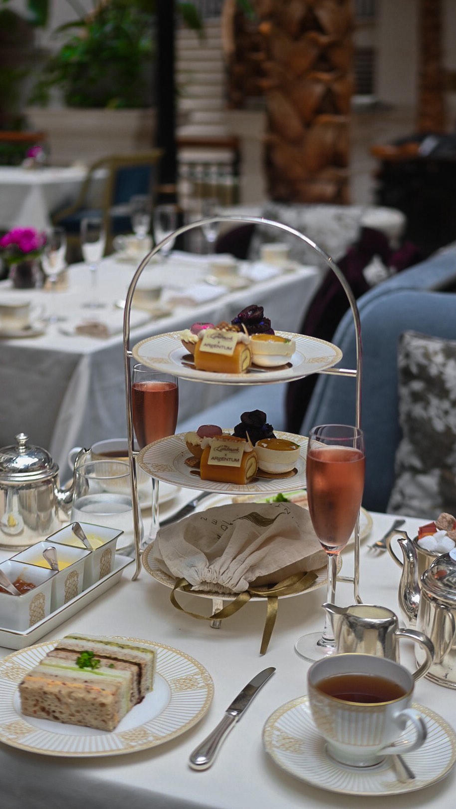 Instagram post by @coffeeandbrunch_ for VISIT LONDON. Caption reads: Indulge in the quintessential British tradition....