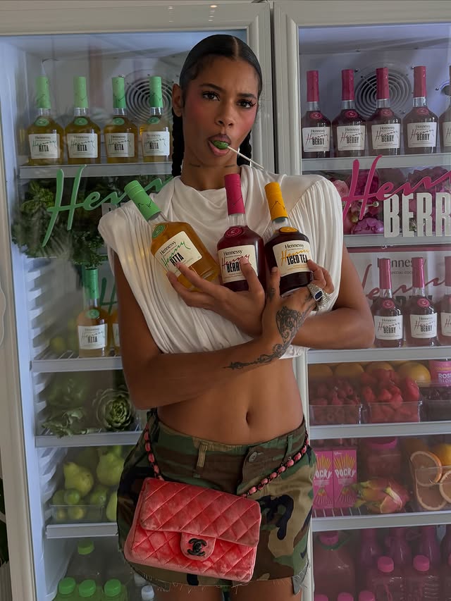 Instagram post by @sierrarenas for Hennessy. Caption reads: [...] all you need to add is ice baby! 🍓🫐....