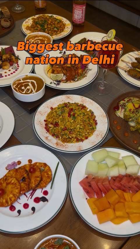 Instagram post by @foodgasm.co.in for Barbeque Nation. Caption reads: Dilli Waalon! CP ka buffet scene ab hone wala hai....