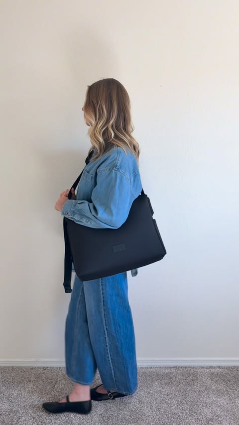 Instagram post by @lindsey_teaches for Dagne Dover. Caption reads: [...] I need a diaper bag or just a bigger....
