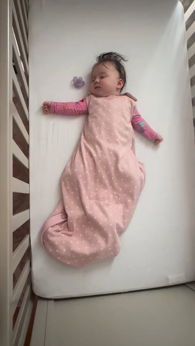 Instagram post by @saralwollner for Woolino. Caption reads: A cozy nap in her Woolino means a peaceful,....