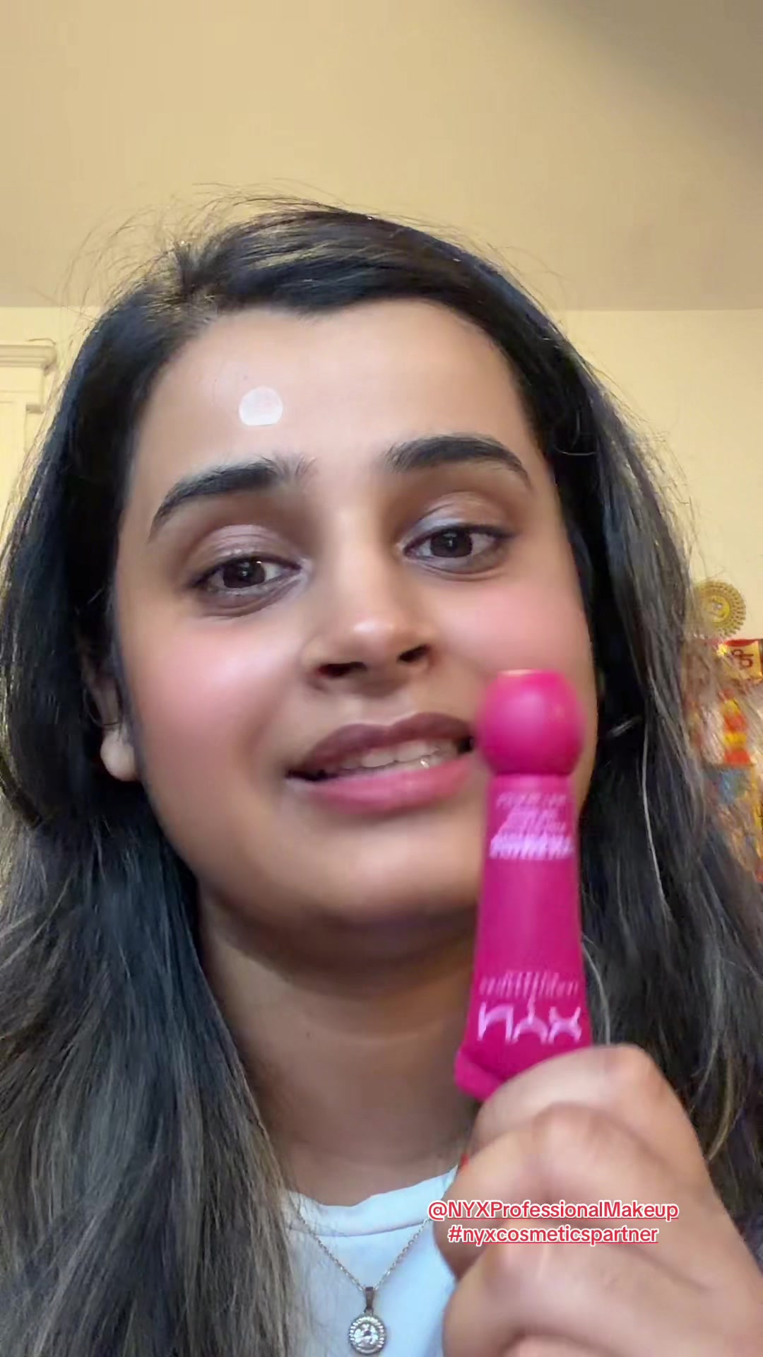 TikTok post by @anuxo_xo for NYX Professional Makeup HR. Caption reads: Trying the smushy matte lip balm from @NYX....