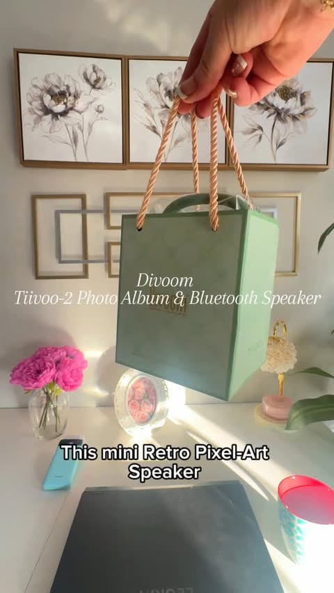 Instagram post by @ugcozy for Divoom. Caption reads: [...] Small body, big personality. 🎧💛 🛒 #divoom....