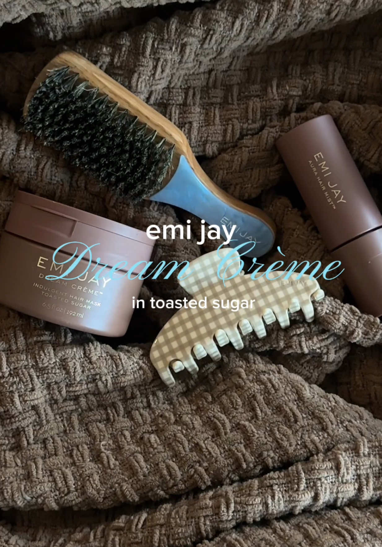 TikTok post by @karisinclairr for Emi Jay. Caption reads: my favorite cozy scent is now in @Emi Jay iconic....
