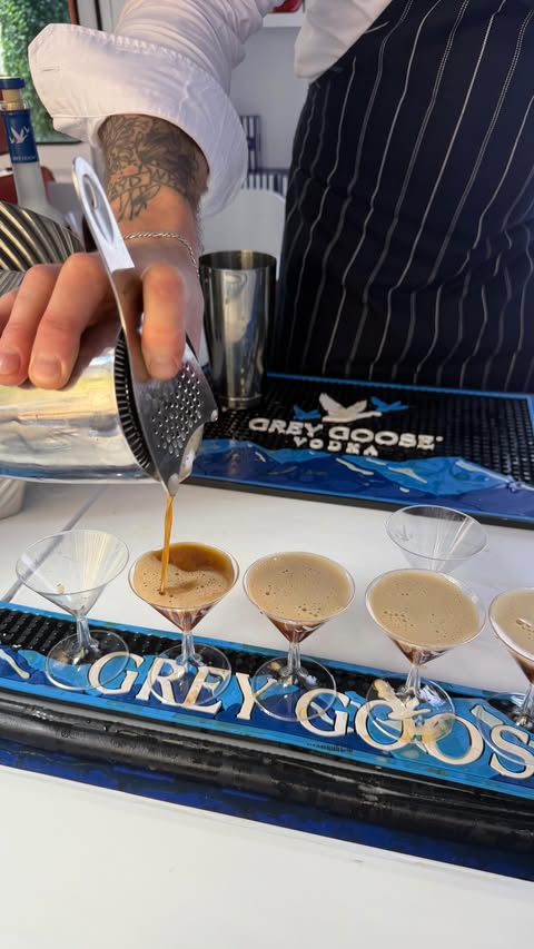 Instagram post by @marisamenist for GREY GOOSE Vodka. Caption reads: Grey Goose x The Devil Wears Prada 2… say less 🖤....