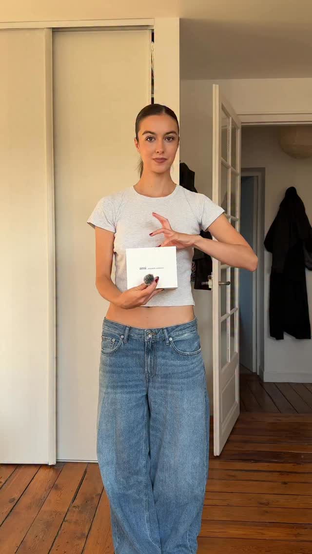 Instagram post by @laraaceliaa for AMI Paris. Caption reads: GRWM for the @amiparis presentation💌  anzeige wg....