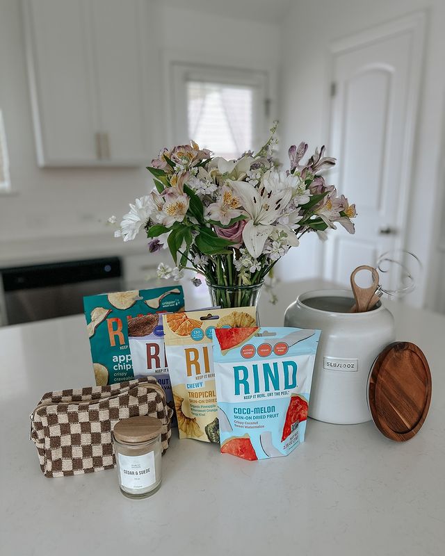 Instagram post by @theregoesjonathan for RIND Snacks. Caption reads: Nothing says “I love you mom” like a great snack....