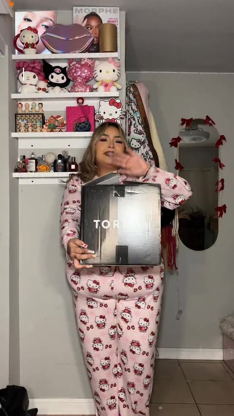 Instagram post by @melanieangelese for Torrid. Caption reads: holiday outfit ideas featuring @torrid 🎄❤️....