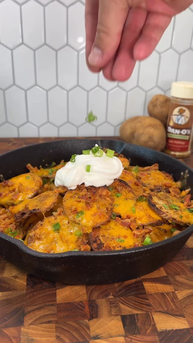 Instagram post by @kyleistook for Dan-O's Seasoning. Caption reads: Irish Pub Nachos 🥔 w/ @danosseasoning #getdusted....