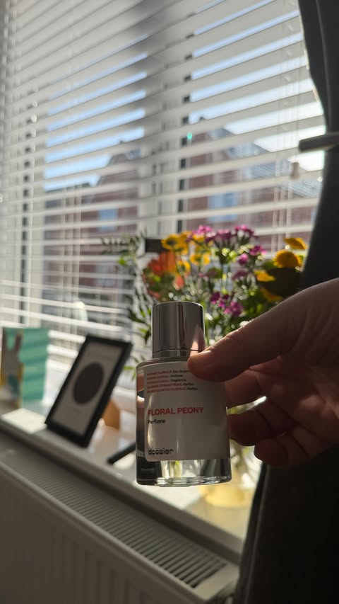 Instagram post by @ronnieandmama for Dossier. Caption reads: April is an exciting month for @dossierperfumes....