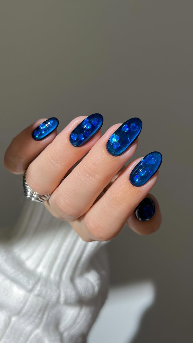 Instagram post by @heygreatnails for Diptyque. Caption reads: not all hearts are red, some are sapphire blue....