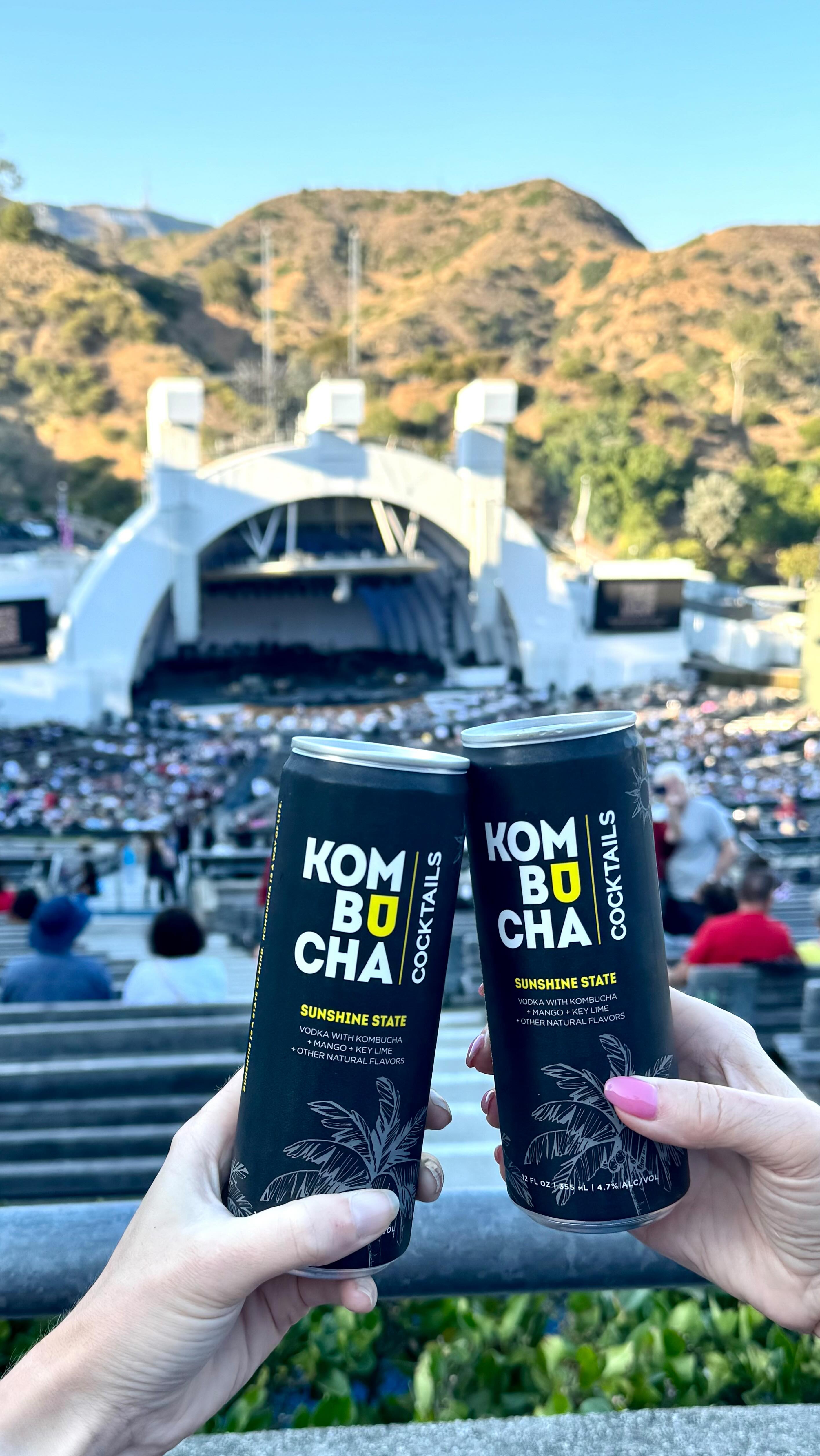Instagram post by @barbieholmes for Total Wine & More. Caption reads: Crack open a can of ready-to-drink KOMBUCHA....