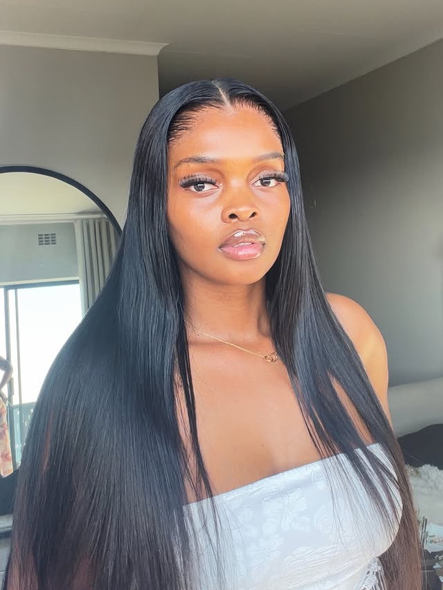 Instagram post by @lelomthabela for Luvme Hair. Caption reads: [...] full and giving effortless GLAM. This Luvme....