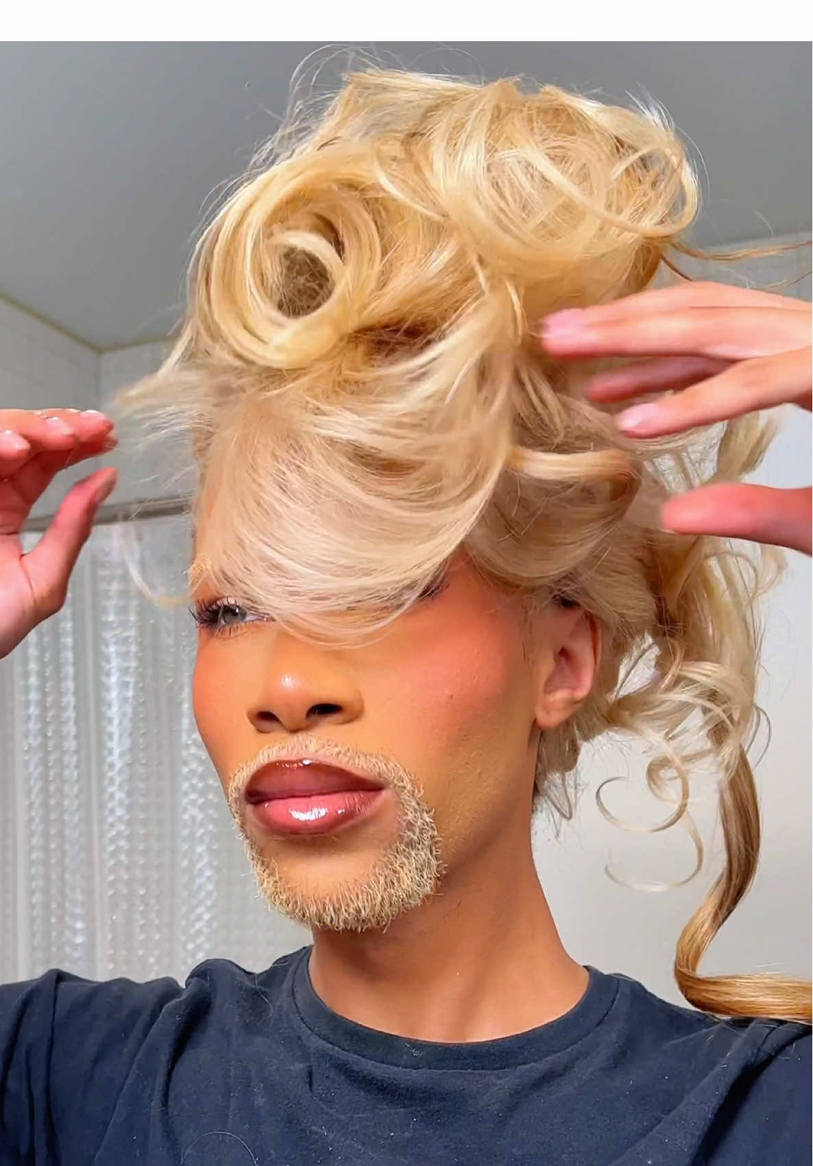 TikTok post by @alfredlewislll for Sebastian Professional. Caption reads: me and updos go together realll bad!....