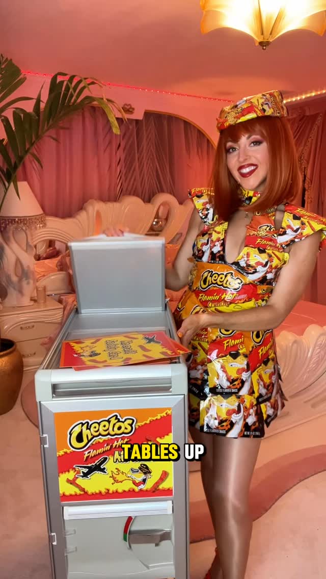 Instagram post by @pineapple_princess_creations for Cheetos. Caption reads: 🔥✈️Flamin’ Hot Safety Breifing, brought to you by....