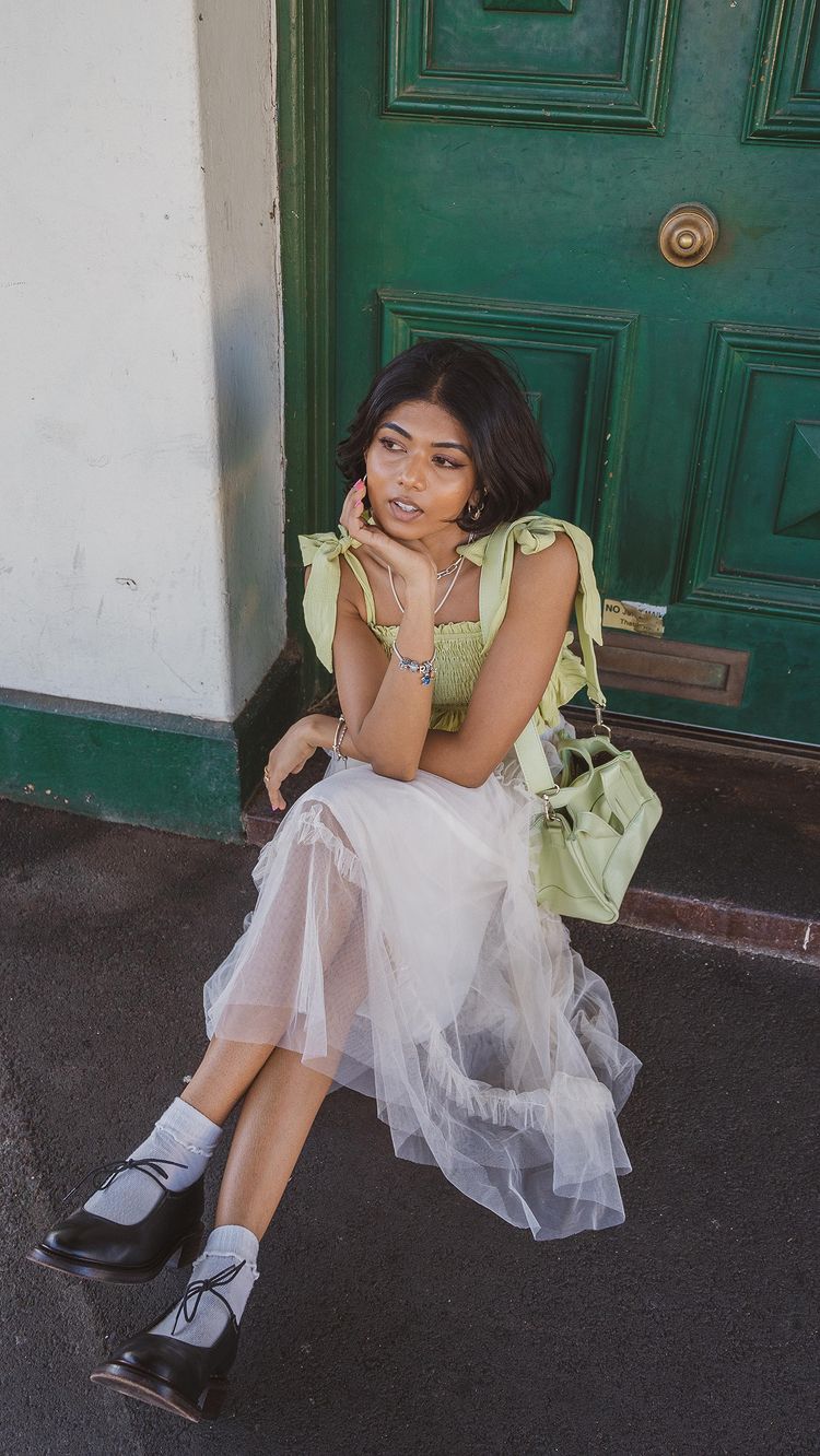 Instagram post by @poseandrepeat for HVISK. Caption reads: [...] - thrifted shoes - @nicole_saldana bag -....