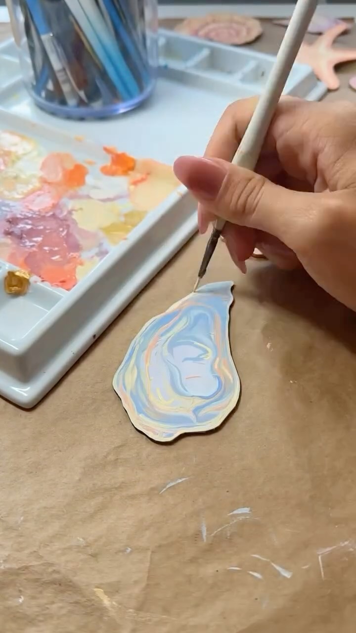 Instagram post by @katehickmanart for Glowforge. Caption reads: 🌊🖌️ Dive into creativity with Kate as she....
