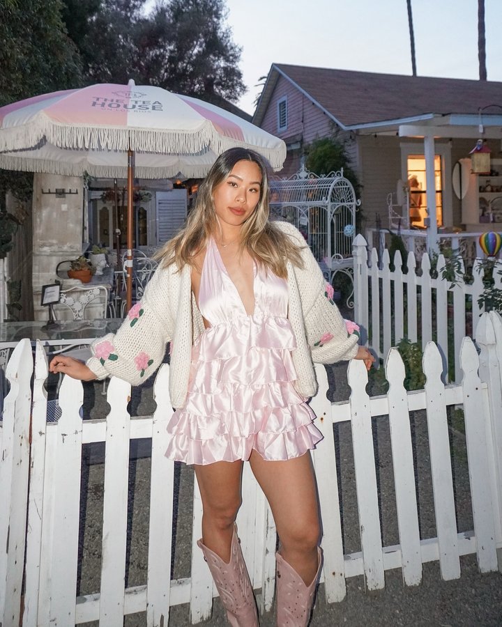 Instagram post by an influencer for Beginning Boutique. Caption reads: [...] •dress & cardigan: @beginningboutique ,....